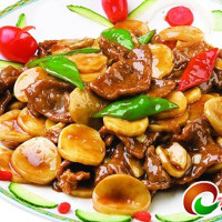Ternera con champiñones